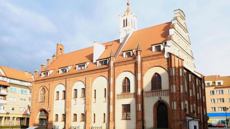 The historic town hall in Kamien Pomorski, Pomerania, Poland shutterstock_1083902894.jpg