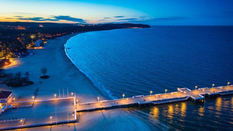 shutterstock_1941748342 Beautiful pier (Molo) in Sopot by the Baltic Sea at dusk, Poland.jpg