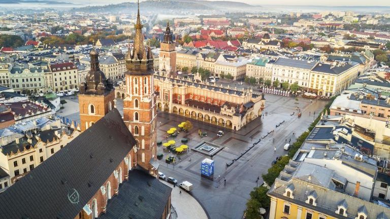 Beautiful historic market square at sunrise, Krakow, Poland shutterstock_740174623.jpg